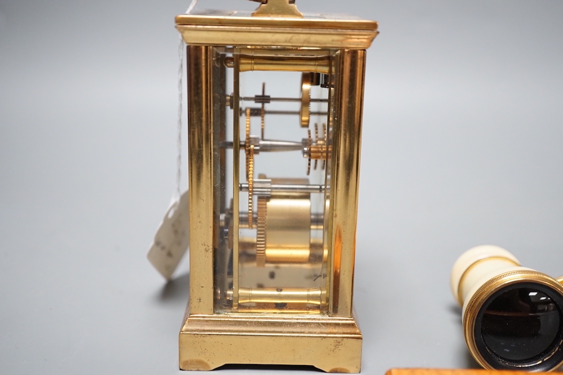 A Mauchline ware snuff box, cased Ivory opera glasses and a brass cased carriage timepiece